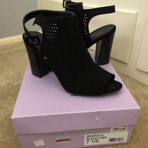 Open toe, sling back heels!